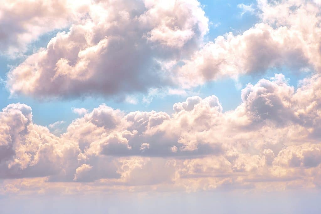 Blue sky and fluffy clouds